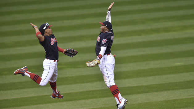 Oct 15, 2016; Cleveland, OH, USA; Cleveland Indians shortstop Francisco Lindor (left) high fives center fielder Rajai Davis (right) after defeating the Toronto Blue Jays in game two of the 2016 ALCS playoff baseball series at Progressive Field. Cleveland won 2-1. Mandatory Credit: David Richard-USA TODAY Sports