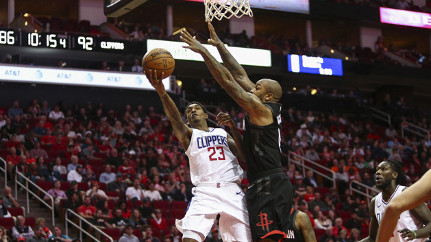 Dec 22, 2017; Houston, TX, USA; LA Clippers guard Lou Williams (23) shoots the ball as Houston Rockets forward PJ Tucker (4) defends during the fourth quarter at Toyota Center. Photo Credit: Troy Taormina-USA TODAY Sports