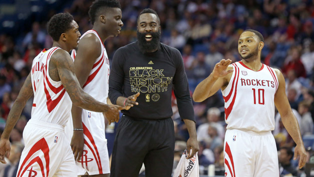 Feb 23, 2017; New Orleans, LA, USA; Houston Rockets guard James Harden (center) talks with guard Lou Williams (12) and center Clint Capela (15) and guard Eric Gordon (10) in the second half against the New Orleans Pelicans at the Smoothie King Center. The Rockets won 129-99. Photo Credit: Chuck Cook-USA TODAY Sports