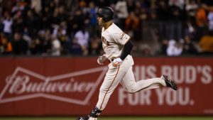Giants slip past Red Sox behind two solo shots