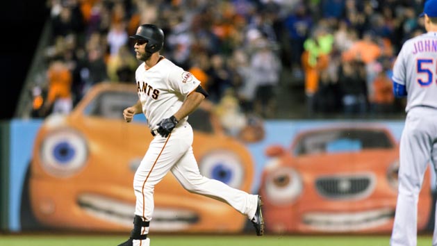 Aug 18, 2016; San Francisco, CA, USA; San Francisco Giants starting pitcher Madison Bumgarner (40) run the bases after hitting a two-run home run against the New York Mets in the fourth inning at AT&T Park. Photo Credit: John Hefti-USA TODAY Sports
