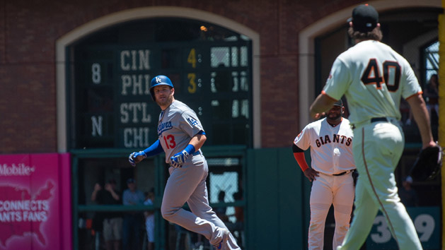 Jun 9, 2019; San Francisco, CA, USA; Los Angeles Dodgers second baseman Max Muncy (13) exchanges words with San Francisco Giants starting pitcher Madison Bumgarner (40) after hitting a home run during the first inning at Oracle Park. Photo Credit: Ed Szczepanski-USA TODAY Sports