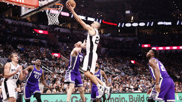 Mar 8, 2017; San Antonio, TX, USA; San Antonio Spurs shooting guard Manu Ginobili (20) shoots the ball around Sacramento Kings center Kosta Koufos (41) during the first half at AT&T Center. Photo Credit: Soobum Im-USA TODAY Sports