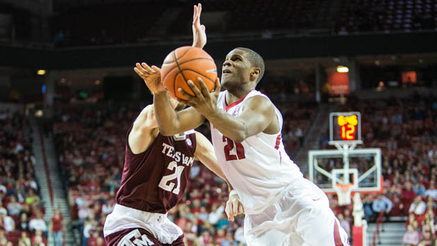 Jan 27, 2016; Fayetteville, AR, USA; Arkansas Razorbacks guard Manuale Watkins (21) drives to the basket for a shot past Texas A&M Aggies guard Alex Caruso (21) during the second half of play at Bud Walton Arena. The Razorbacks won 74-71. Mandatory Credit: Gunnar Rathbun-USA TODAY Sports