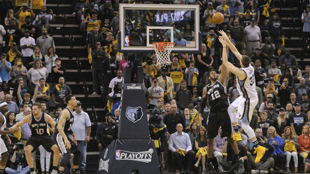 Apr 22, 2017; Memphis, TN, USA; Memphis Grizzlies center Marc Gasol (33) shoots a game winning shot over San Antonio Spurs forward LaMarcus Aldridge (12) in overtime of game four of the first round of the 2017 NBA Playoffs at FedExForum. Memphis Grizzlies defeated the San Antonio Spurs 110-108 in overtime. Photo Credit: Justin Ford-USA TODAY Sports