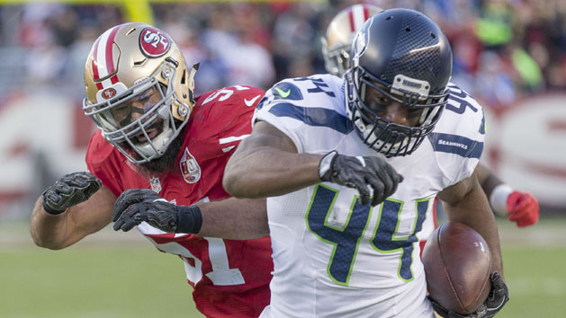 Jan 1, 2017; Santa Clara, CA, USA; Seattle Seahawks fullback Marcel Reece (44) is pushed out of bounds by San Francisco 49ers inside linebacker Michael Wilhoite (57) during the fourth quarter at Levis Stadium Seahawks defeated the 49ers 25-23. Photo Credit: Neville E. Guard-USA TODAY Sports