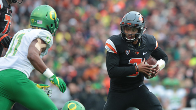 Nov 26, 2016; Corvallis, OR, USA; Oregon State Beavers quarterback Marcus McMaryion (3) runs the ball against Oregon Ducks defensive lineman Justin Hollins (11) at Reser Stadium. Photo Credit: Scott Olmos-USA TODAY Sports