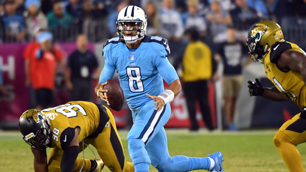 Oct 27, 2016; Nashville, TN, USA; Tennessee Titans quarterback Marcus Mariota (8) scrambles out of the pocket in the first half against the Jacksonville Jaguars at Nissan Stadium. Photo Credit: Christopher Hanewinckel-USA TODAY Sports