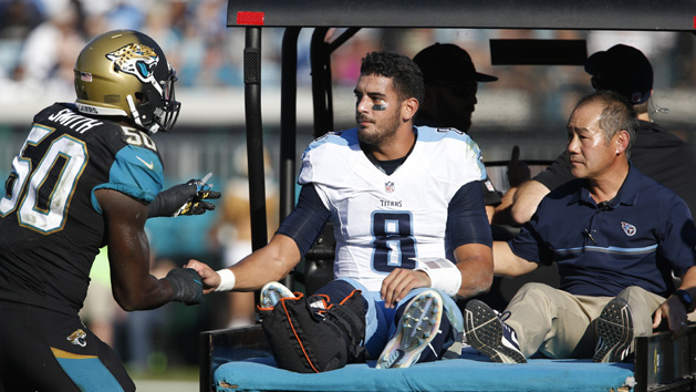 Dec 24, 2016; Jacksonville, FL, USA; Jacksonville Jaguars outside linebacker Telvin Smith (50) speaks to Tennessee Titans quarterback Marcus Mariota (8) following a leg injury during the third quarter of an NFL Football game at EverBank Field. Photo Credit: Reinhold Matay-USA TODAY Sports