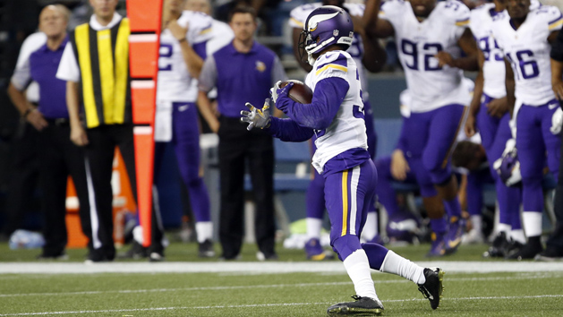 Aug 18, 2016; Seattle, WA, USA; Minnesota Vikings cornerback Marcus Sherels (35) intercepts a pass against the Seattle Seahawks during the fourth quarter at CenturyLink Field. Sherels returned it for the winning touchdown. Minnesota defeated Seattle, 18-11. Photo Credit: Joe Nicholson-USA TODAY Sports
