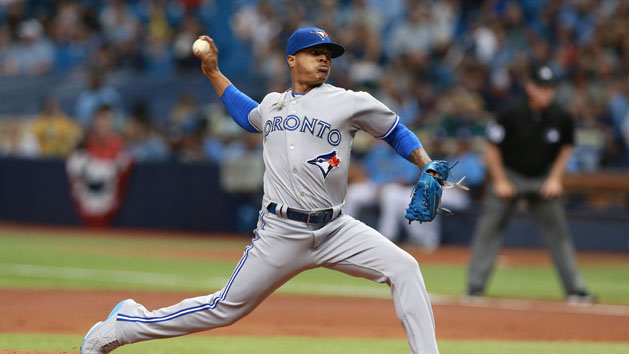 Apr 3, 2016; St. Petersburg, FL, USA; Toronto Blue Jays starting pitcher Marcus Stroman (6) throws a pitch during the first inning against the Tampa Bay Rays at Tropicana Field. Mandatory Credit: Kim Klement-USA TODAY Sports