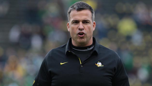 Nov 25, 2017; Eugene, OR, USA; Mario Cristobal co-offensive coordinator and run-game coordinator for the Oregon Ducks walks onto the field before the game against the Oregon State Beavers at Autzen Stadium. Photo Credit: Scott Olmos-USA TODAY Sports