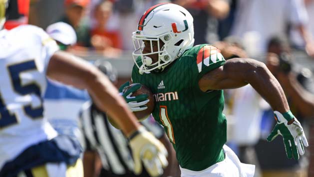 Oct 1, 2016; Atlanta, GA, USA; Miami Hurricanes running back Mark Walton (1) runs the ball for a touchdown during the second quarter against the Georgia Tech Yellow Jackets at Bobby Dodd Stadium. Photo Credit: Shanna Lockwood-USA TODAY Sports