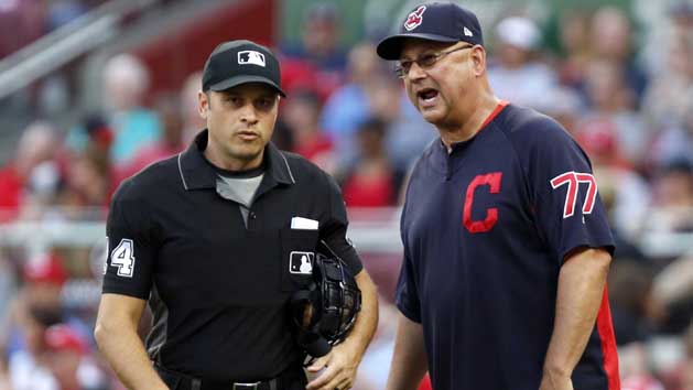 Aug 13, 2018; Cincinnati, OH, USA; Cleveland Indians manager Terry Francona (77) talks with home plate umpire Mark Wegner (14) during the second inning against the Cincinnati Reds at Great American Ball Park. Photo Credit: David Kohl-USA TODAY Sports