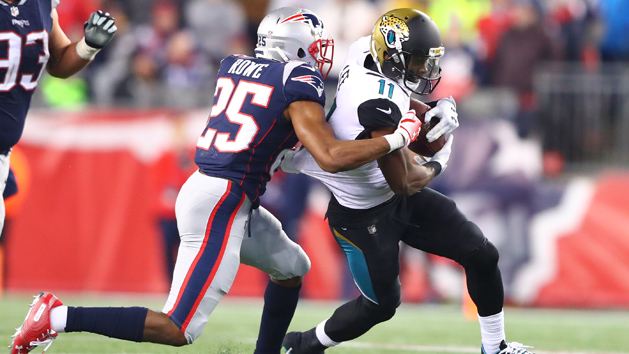 Jan 21, 2018; Foxborough, MA, USA; Jacksonville Jaguars wide receiver Marqise Lee (11) is tackled by New England Patriots cornerback Eric Rowe (25) in the AFC Championship Game at Gillette Stadium. Photo Credit: Mark J. Rebilas-USA TODAY Sports