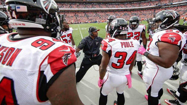 Oct 9, 2016; Denver, CO, USA; Atlanta Falcons secondary coach Marquand Manuel talks with defensive back Brian Poole (34) and defensive end Tyson Jackson (94) and teammates in the second quarter against the Denver Broncos at Sports Authority Field at Mile High. The Falcons won 23-16. Photo Credit: Isaiah J. Downing-USA TODAY Sports