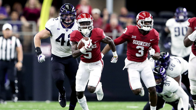 Dec 2, 2017; Arlington, TX, USA; Oklahoma Sooners wide receiver Marquise Brown (5) runs with the ball during the first quarter against the TCU Horned Frogs in the Big 12 Championship game at AT&;T Stadium. Photo Credit: Kevin Jairaj-USA TODAY Sports