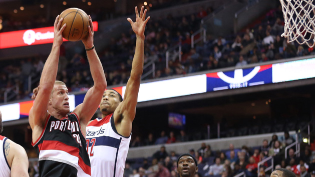 Jan 16, 2017; Washington, DC, USA; Portland Trail Blazers center Mason Plumlee (24) shoots the ball as Washington Wizards forward Otto Porter Jr. (22) defends in the second quarter at Verizon Center. Photo Credit: Geoff Burke-USA TODAY Sports