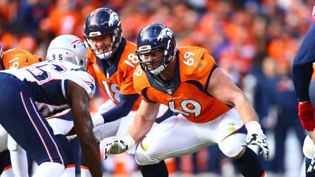 Denver Broncos guard Evan Mathis (69) blocks for quarterback Peyton Manning (18) against the New England Patriots in the AFC Championship football game at Sports Authority Field at Mile High. The Broncos defeated the Patriots 20-18 to advance to the Super Bowl. Photo Credit: Mark J. Rebilas-USA TODAY Sports