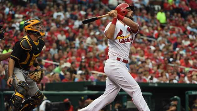 Jul 6, 2016; St. Louis, MO, USA; St. Louis Cardinals second baseman Matt Carpenter (13) holds his side after a swing during the third inning against the Pittsburgh Pirates at Busch Stadium. Carpenter left the game with a right oblique injury. Photo Credit: Jeff Curry-USA TODAY Sports