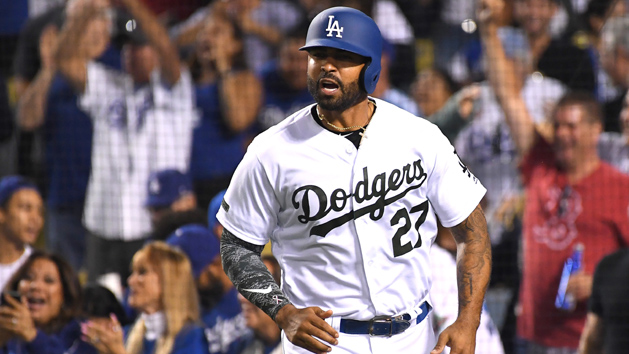 May 28, 2018; Los Angeles, CA, USA; Fans cheer Los Angeles Dodgers left fielder Matt Kemp (27) after he crossed the plate for the go ahead run in the eighth inning against the Philadelphia Phillies at Dodger Stadium. Photo Credit: Jayne Kamin-Oncea-USA TODAY Sports