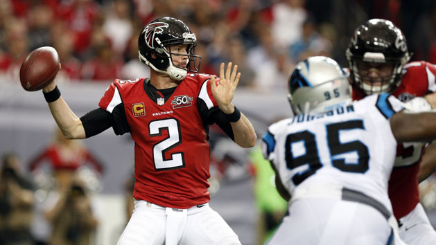 Dec 27, 2015; Atlanta, GA, USA; Atlanta Falcons quarterback Matt Ryan (2) throws the ball under pressure from Carolina Panthers defensive end Charles Johnson (95) in the third quarter at the Georgia Dome. Mandatory Credit: Jason Getz-USA TODAY Sports