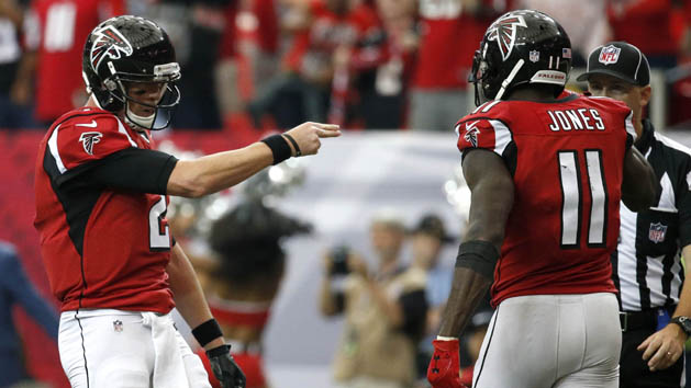 Oct 2, 2016; Atlanta, GA, USA; Atlanta Falcons wide receiver Julio Jones (11) celebrates his touchdown catch with quarterback Matt Ryan (2) in the fourth quarter of their game against the Carolina Panthers at the Georgia Dome. The Falcons won 48-33. Photo Credit: Jason Getz-USA TODAY Sports