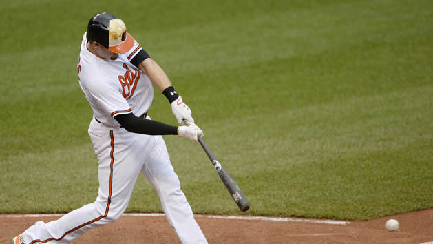 Jun 5, 2016; Baltimore, MD, USA; Baltimore Orioles catcher Matt Wieters (32) hits a two run single during the eighth inning against the New York Yankees at Oriole Park at Camden Yards. The Orioles won 3-1. Photo Credit: Tommy Gilligan-USA TODAY Sports