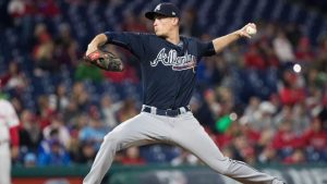 Freeman aims to play as Braves visit Brewers