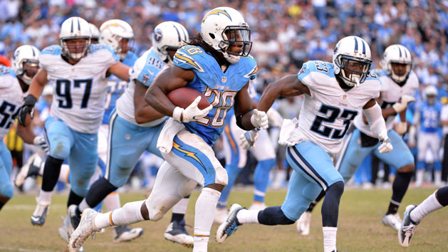Nov 6, 2016; San Diego, CA, USA; San Diego Chargers running back Melvin Gordon (28) runs the ball as Tennessee Titans defensive back Brice McCain (23) defends during the second half at Qualcomm Stadium. San Diego won 43-35. Photo Credit: Orlando Ramirez-USA TODAY Sports