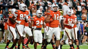 Week 12 Lowe Down: Miami, Wisconsin carry on