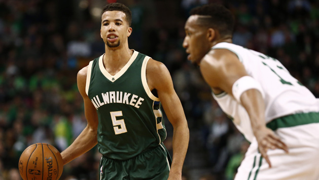 Feb 25, 2016; Boston, MA, USA; Milwaukee Bucks guard Michael Carter-Williams (5) dribbles the ball as Boston Celtics guard Evan Turner (11) defends during the first half at TD Garden. Photo Credit: Mark L. Baer-USA TODAY Sports