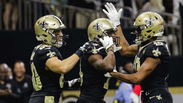 Nov 4, 2018; New Orleans, LA, USA; New Orleans Saints wide receiver Michael Thomas (13) pulls out a cell phone to celebrate a touchdown along with teammates wide receiver Austin Carr (80) and wide receiver Tre'Quan Smith (10) during the fourth quarter against the Los Angeles Rams at the Mercedes-Benz Superdome. Photo Credit: Derick E. Hingle-USA TODAY Sports
