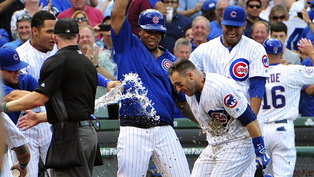 Sep 16, 2016; Chicago, IL, USA; Chicago Cubs catcher Miguel Montero (47) is doused with water after hitting a walk-off home run against the Milwaukee Brewers during the tenth inning at Wrigley Field. The Cubs won 5-4. Photo Credit: David Banks-USA TODAY Sports