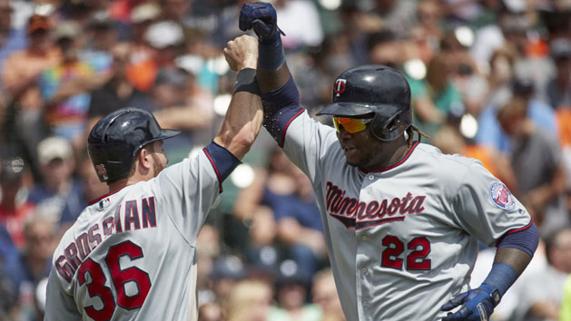 Aug 13, 2017; Detroit, MI, USA; Minnesota Twins first baseman Miguel Sano (22) receives congratulations from right fielder Robbie Grossman (36) after he hits a two run home run in the third inning against the Detroit Tigers at Comerica Park. Photo Credit: Rick Osentoski-USA TODAY Sports