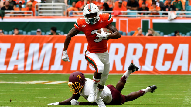 Sep 2, 2017; Miami Gardens, FL, USA; Miami Hurricanes wide receiver Mike Harley (3) runs past Bethune Cookman Wildcats cornerback Jamaal Burgess (3) during the first half at Hard Rock Stadium. Photo Credit: Steve Mitchell-USA TODAY Sports