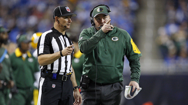 Dec 3, 2015; Detroit, MI, USA; Green Bay Packers head coach Mike McCarthy talks to a referee and points during the fourth quarter against the Detroit Lions at Ford Field. Packers win 27-23. Mandatory Credit: Raj Mehta-USA TODAY Sports