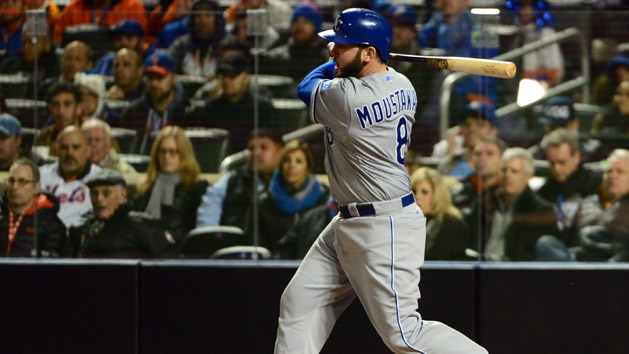 Oct 31, 2015; New York City, NY, USA; Kansas City Royals third baseman Mike Moustakas (8) hits a RBI single against the New York Mets in the 8th inning in game four of the World Series at Citi Field. Mandatory Credit: Jeff Curry-USA TODAY Sports