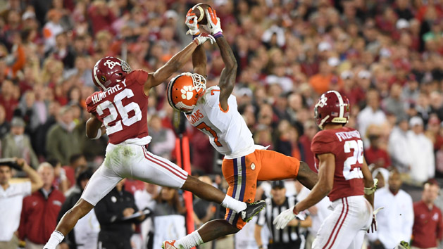 Jan 9, 2017; Tampa, FL, USA; Clemson Tigers wide receiver Mike Williams (7) catches a pass between Alabama Crimson Tide defensive back Marlon Humphrey (26) and defensive back Minkah Fitzpatrick (29) in the 207 College Football Playoff National Championship Game at Raymond James Stadium. Photo Credit: Bart Boatwright/The Greenville News via USA TODAY Sports