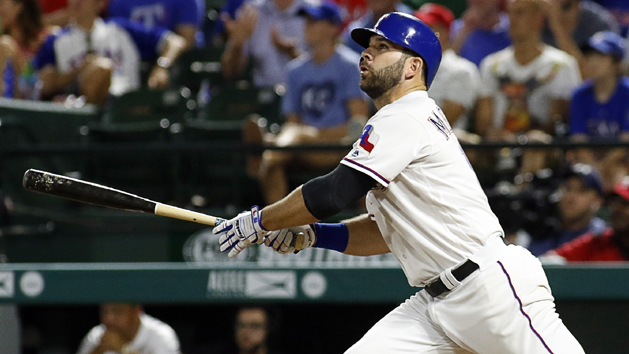 Jul 28, 2016; Arlington, TX, USA; Texas Rangers first baseman Mitch Moreland (18) hits his second home run of the game in the eight inning against the Kansas City Royals at Globe Life Park in Arlington. The Rangers won 3-2. Photo Credit: Ray Carlin-USA TODAY Sports