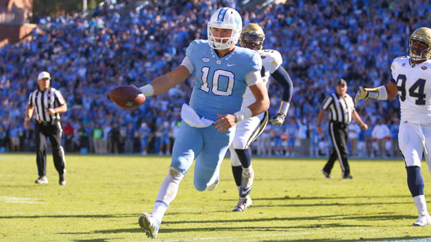 Nov 5, 2016; Chapel Hill, NC, USA; North Carolina Tar Heels quarterback Mitch Trubisky (10) scores a touchdown on his forth quarter run against the Georgia Tech Yellow Jackets at Kenan Memorial Stadium. The North Carolina Tar Heels defeated the Georgia Tech Yellow Jackets 48-20. Photo Credit: James Guillory-USA TODAY Sports