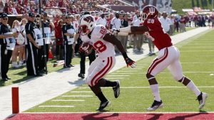 Badgers’ once unstoppable rushing attack is absent
