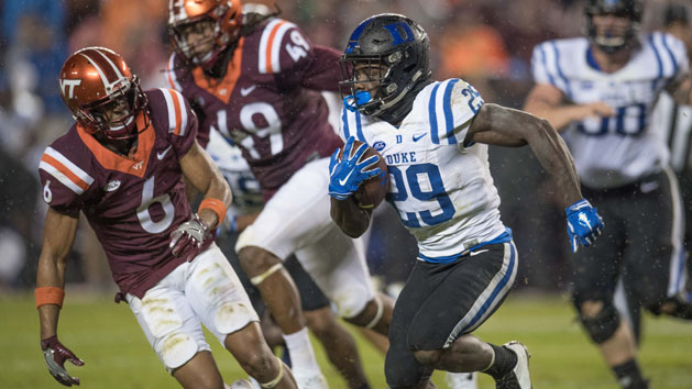 Oct 28, 2017; Blacksburg, VA, USA; Duke Blue Devils running back Shaun Wilson (29) runs the ball in the second period as Virginia Tech Hokies defensive back Mook reynolds chases play at Lane Stadium. Photo Credit: Lee Luther Jr.-USA TODAY Sports