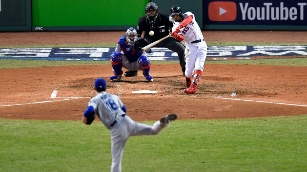 Oct 24, 2018; Boston, MA, USA; Boston Red Sox right fielder Mookie Betts (50) hits a double off of a pitch by Los Angeles Dodgers pitcher Kenta Maeda (18) during the seventh inning in game two of the 2018 World Series at Fenway Park. Photo Credit: Greg M. Cooper-USA TODAY Sports