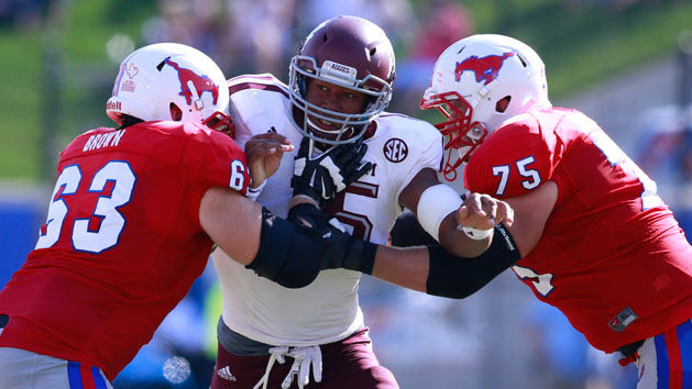Defensive end Myles Garrett (15) is a load for offensive linemen to handle. Tim Heitman-USA TODAY Sports