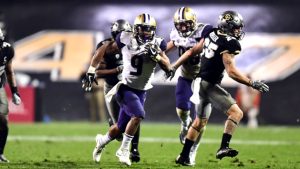 No. 7 Washington runs over mistake-prone Colorado