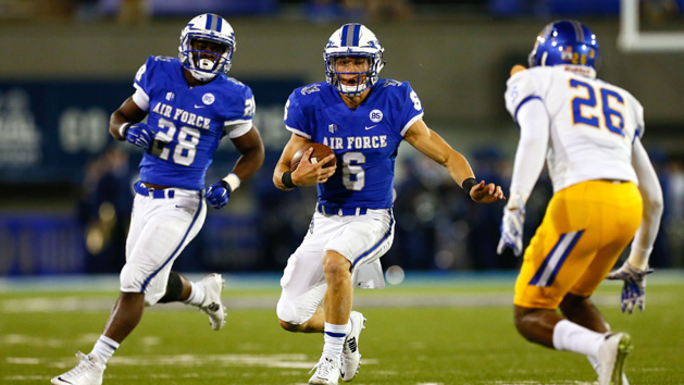 Sep 12, 2015; Colorado Springs, CO, USA; Air Force Falcons quarterback Nate Romine (6) runs the ball against San Jose State Spartans safety Vincente Miles Jr (26) in front of Falcons running back Jacobi Owens (28) in the second quarter at Falcon Stadium. Mandatory Credit: Isaiah J. Downing-USA TODAY Sports