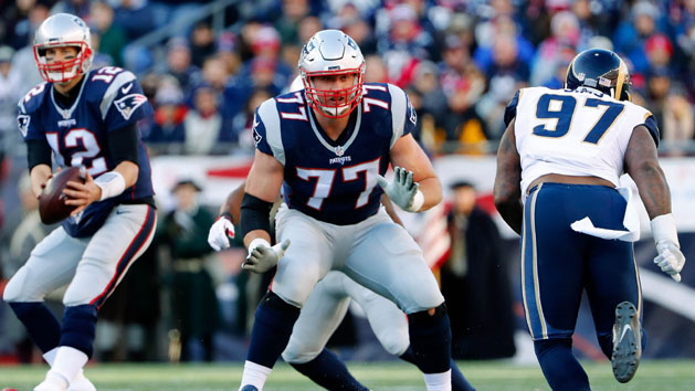Dec 4, 2016; Foxborough, MA, USA; New England Patriots tackle Nate Solder (77) blocks for New England Patriots quarterback Tom Brady (12) against the Los Angeles Rams during the first half at Gillette Stadium. Photo Credit: Winslow Townson-USA TODAY Sports