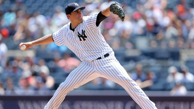 Jul 24, 2016; Bronx, NY, USA; New York Yankees starting pitcher Nathan Eovaldi (30) pitches against the San Francisco Giants during the first inning at Yankee Stadium. Photo Credit: Brad Penner-USA TODAY Sports