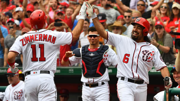Jul 27, 2017; Washington, DC, USA; Washington Nationals first baseman Ryan Zimmerman (11) is congratulated by third baseman Anthony Rendon (6) after hitting a solo homer against the Milwaukee Brewers during the third inning at Nationals Park. Photo Credit: Brad Mills-USA TODAY Sports